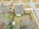 Expansive fenced backyard features a patio, storage shed, and lush greenery, creating a private outdoor oasis and space at 600 Lockerbie Ter, Mcdonough, GA 30252