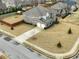 A beautifully landscaped property features a well-manicured lawn, complemented by a spacious driveway and an enclosed backyard at 600 Lockerbie Ter, Mcdonough, GA 30252