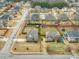 Aerial view of 600 Lockerbie Terrace in a neighborhood with well-maintained lawns at 600 Lockerbie Ter, Mcdonough, GA 30252