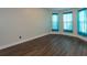 This bedroom features a stylish color scheme, vinyl floors and great natural lighting at 600 Lockerbie Ter, Mcdonough, GA 30252