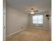 Cozy bedroom featuring carpeted flooring and a ceiling fan at 600 Lockerbie Ter, Mcdonough, GA 30252