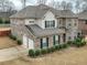 Stunning home with a turret, two-car garage, long driveway, and meticulous landscaping at 600 Lockerbie Ter, Mcdonough, GA 30252