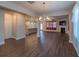 Open living room featuring hardwood floors, chandelier, and open floor plan at 600 Lockerbie Ter, Mcdonough, GA 30252