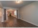 Open-concept living space with vinyl floors and neutral walls, perfect for entertaining at 600 Lockerbie Ter, Mcdonough, GA 30252