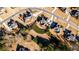 Aerial view of a neighborhood showcasing well-maintained homes and manicured lawns at 1137 Maple Creek Rdg, Loganville, GA 30052