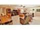 Finished basement with entertainment area, including a large television, comfortable seating, and built-in shelving at 1137 Maple Creek Rdg, Loganville, GA 30052