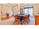 Formal dining room with large table, carpet, and classic furnishings at 1137 Maple Creek Rdg, Loganville, GA 30052