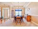 Formal dining room with a blue tablecloth, carpet, and classic furnishings at 1137 Maple Creek Rdg, Loganville, GA 30052