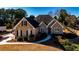 Charming brick home with a well-manicured front yard and inviting entrance at 1137 Maple Creek Rdg, Loganville, GA 30052