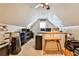 Attic room home office with built-in desks, great natural light, and good storage at 1137 Maple Creek Rdg, Loganville, GA 30052