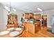 Kitchen and breakfast nook featuring wooden cabinetry and hardwood floors at 1137 Maple Creek Rdg, Loganville, GA 30052