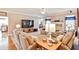 Bright living room with a fireplace, large TV, and plush seating, perfect for relaxation and entertainment at 1137 Maple Creek Rdg, Loganville, GA 30052