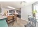 Bright kitchen with stainless steel appliances, gray cabinets, granite countertops and wood floors at 80 Pooles Bend Ct, Hiram, GA 30141