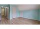 Bedroom with vaulted ceiling, wood-look floors, and a large open space at 500 Nicole Se Ct, Conyers, GA 30094