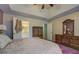 Spacious bedroom featuring a glimpse into the ensuite bathroom through an open doorway at 500 Nicole Se Ct, Conyers, GA 30094