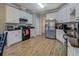 Bright kitchen features modern stainless steel appliances and ample cabinet space for storage at 500 Nicole Se Ct, Conyers, GA 30094