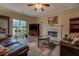 Inviting living room featuring a fireplace, hardwood floors, and a cozy seating area at 500 Nicole Se Ct, Conyers, GA 30094