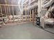 Unfinished basement with exposed framing, insulation, and HVAC system at 2235 Windsor Bluffs Dr, Cumming, GA 30041