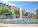 Beautiful water fountain surrounded by shops, creating a vibrant community space at 2235 Windsor Bluffs Dr, Cumming, GA 30041