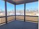 This covered back porch overlooks the backyard and provides a place to relax and entertain at 2235 Windsor Bluffs Dr, Cumming, GA 30041