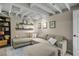 Cozy finished basement with a sectional sofa, shelving, and comfortable living space at 2436 Elmwood Se Cir, Atlanta, GA 30339