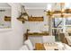 Dining room boasting a stylish wine rack, a modern light fixture, and comfortable seating at 2436 Elmwood Se Cir, Atlanta, GA 30339