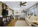 Open-concept living room and dining area featuring hardwood floors and natural light at 2436 Elmwood Se Cir, Atlanta, GA 30339