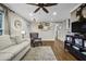 Cozy living room with neutral tones, hardwood floors, and ample natural light at 2436 Elmwood Se Cir, Atlanta, GA 30339
