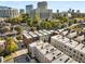 Aerial view of a townhome community and the surrounding cityscape at 304 Stonemont Dr, Atlanta, GA 30305