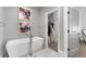 Bright bathroom features a modern tub, closet access, and modern art at 304 Stonemont Dr, Atlanta, GA 30305