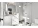 Neutral bathroom with a glass-enclosed shower, vanity with a marble countertop, and black accents at 304 Stonemont Dr, Atlanta, GA 30305