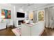 Bright living room with fireplace, large windows, and comfortable seating, perfect for relaxation at 304 Stonemont Dr, Atlanta, GA 30305