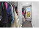 Spacious walk-in closet with custom shelving, hanging racks and window at 304 Stonemont Dr, Atlanta, GA 30305