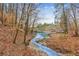 The property has creek frontage with lake access at 3510 Riviera Dr, Cumming, GA 30041