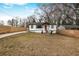 Inviting home with a spacious front yard, bright exterior, and a welcoming entrance at 1459 Kenilworth Sw Dr, Atlanta, GA 30310
