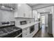 Well-appointed kitchen featuring sleek countertops, stainless steel appliances, and ample storage at 1459 Kenilworth Sw Dr, Atlanta, GA 30310