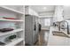 Bright kitchen offers stainless steel appliances, quartz countertops, and modern fixtures at 1459 Kenilworth Sw Dr, Atlanta, GA 30310