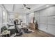 Open-concept living space with hardwood floors, modern decor, and a view into the kitchen at 1459 Kenilworth Sw Dr, Atlanta, GA 30310