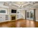 Inviting living room with fireplace, built-in cabinets, and coffered ceiling at 1590 N Morningside Ne Dr, Atlanta, GA 30306