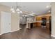 Open-concept layout connecting the kitchen and dining area, featuring stainless steel appliances and ample counter space at 131 Ellis Dr, Conyers, GA 30012