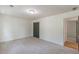 Spacious bedroom with carpet floors and neutral walls at 418 Mockingbird, Smyrna, GA 30082