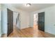Open living area featuring hardwood floors and an abundance of natural light at 418 Mockingbird, Smyrna, GA 30082
