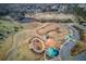 An aerial view of Alexander Park with walking trails, green space, playground, pond, and picnic pavilions at 868 Clarion Way, Lawrenceville, GA 30044