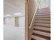 Finished basement with carpeted floors and staircase at 868 Clarion Way, Lawrenceville, GA 30044