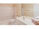 Bathroom with white cabinets, a bathtub and shower combination at 868 Clarion Way, Lawrenceville, GA 30044