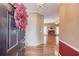 Inviting living room featuring hardwood floors, a cozy fireplace, and neutral paint, creating a warm atmosphere at 868 Clarion Way, Lawrenceville, GA 30044