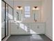 Bathroom features double vanities, sleek mirrors, and a modern walk-in shower at 3165 Old Jonesboro Rd, Hapeville, GA 30354