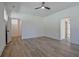 Open and airy bedroom with modern ceiling fan, hardwood floors, and plenty of natural light at 3165 Old Jonesboro Rd, Hapeville, GA 30354