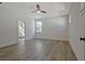 Bright, open bedroom with a ceiling fan and hardwood floors, providing a comfortable living space at 3165 Old Jonesboro Rd, Hapeville, GA 30354