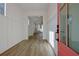 Bright foyer with hardwood floors and elegant wall paneling at 3165 Old Jonesboro Rd, Hapeville, GA 30354